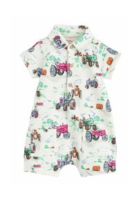 Rompers à manches courtes en tissu crème avec des illustrations de tracteurs colorés. La fermeture à boutons et les poches avant soulignent le design ludique.