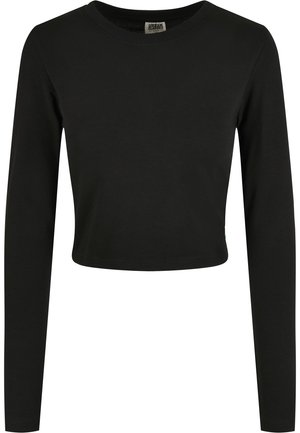 Top corto de manga larga negro en algodón suave, con un cuello redondo y un diseño ajustado que incluye una pequeña etiqueta verde en el lateral.