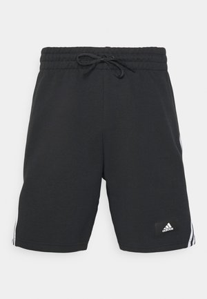 Zwarte polyester shorts met een elastische tailleband en verstelbare trekkoorden. Voorzien van drie witte strepen aan de zijkanten en een klein logopatch.