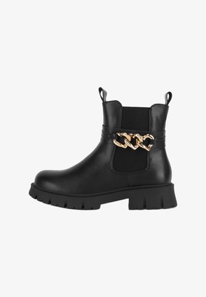 Must nahast pahkluu saabaste paksu tallaga, elastsete külgpaneelide, tõmblintidega ja välisküljel dekoratiivse kuldse kett-detailiga.