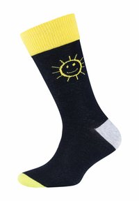 Marineblaue Socken mit gelbem geripptem Bündchen zeigen ein lächelndes Sonnenmotiv und kontrastierende graue Fersen- und Zehenakzente, hergestellt aus weichem Material.
