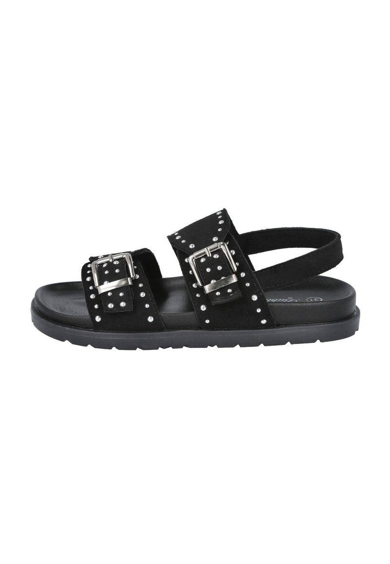 Sandalias de ante negro con dos correas anchas, adornos de tachuelas plateados, grandes hebillas de metal y una suela de goma negra texturizada.