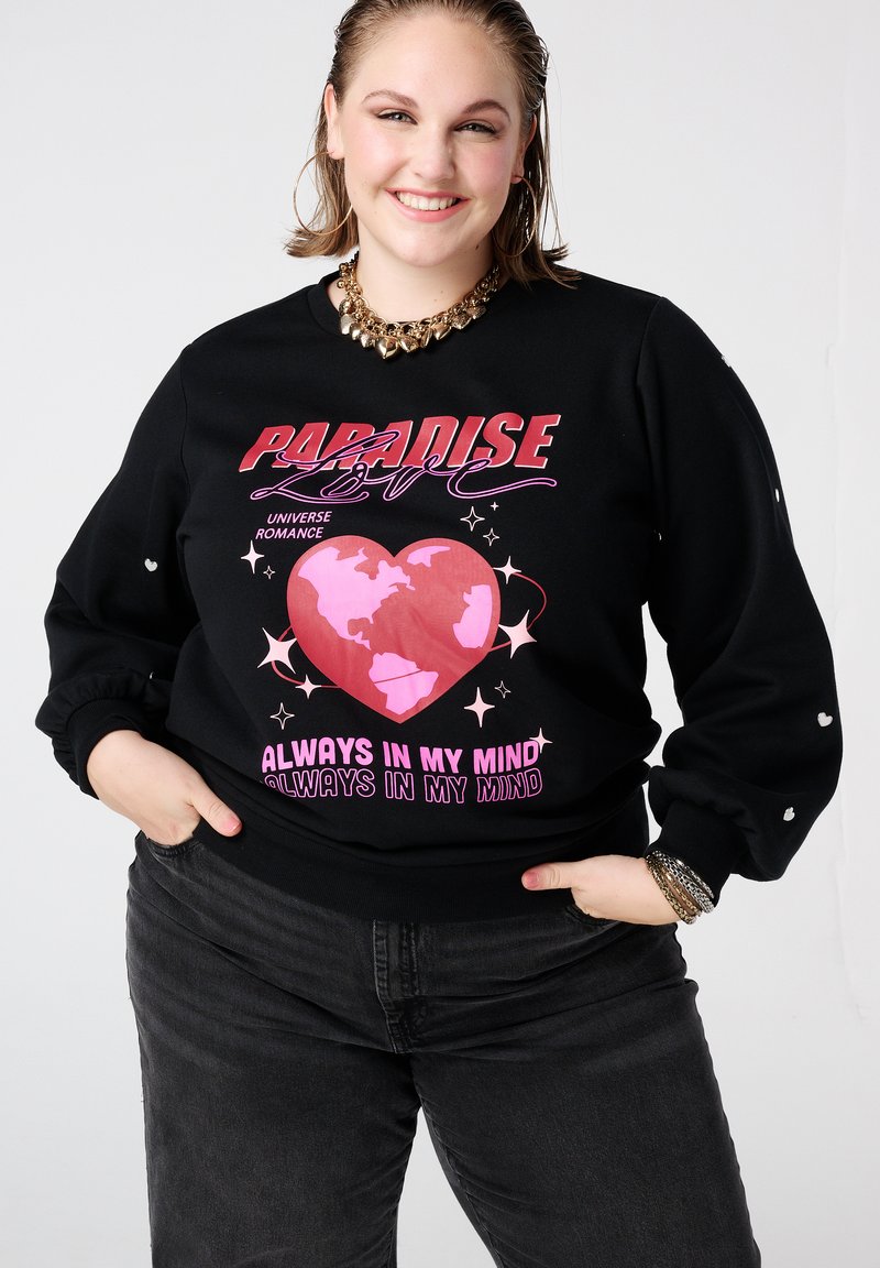 Zwarte sweatshirt met een kleurrijke afbeelding van een hart en aarde, inclusief tekst. Lange mouwen met subtiele pofdetails bij de manchetten. Zachte stof.