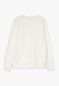 Witte sweatshirt met een ronde hals en raglanmouwen. Heeft een gladde textuur en ribbelboorden bij de mouwen en onderkant. Eenvoudig rugview.