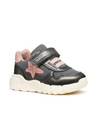 Des baskets noires et grises présentent une étoile rose en accent, une sangle Velcro et une semelle blanche. Construites en cuir et en matériaux textiles.