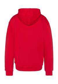 Sudadera de algodón roja con una capucha grande y plana. Presenta mangas largas, puños acanalados y una cintura acanalada. Diseño minimalista sin logotipos visibles.