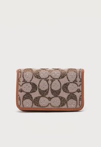 Επιλέχθηκε, tan