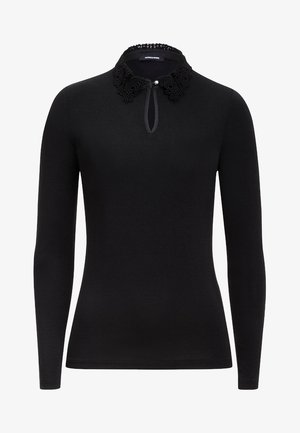 Sort langærmet top med en tekstureret blondekrave og knaplukning ved halsen. Tætsiddende design, glat stof og uden mønstre.