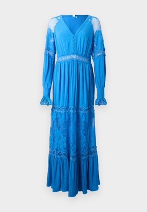 Long blue dress with a deep V-neck, button details, lace accents on sleeves, and layered ruffle hemline. Made from lightweight, textured fabric.