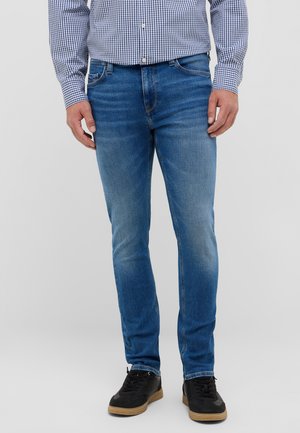 - Jeansy Slim Fit