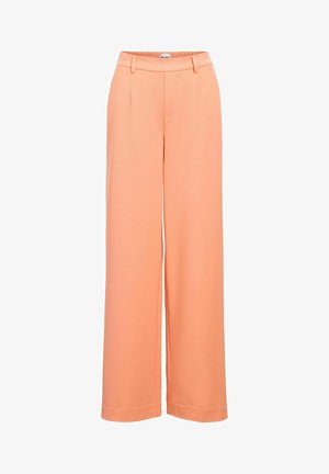 Wide-leg trousers in peach fabric, featuring a smooth texture, flat front with pleats, and an elastic waistband for comfort.