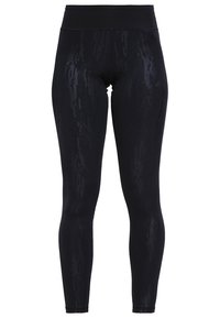 Leggings negros con cintura alta, ajuste elegante y textura de patrón digital sutil, diseñados para comodidad y flexibilidad durante las actividades.
