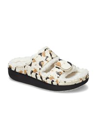 Chaussons avec un dessus rembourré blanc arborant un motif de chien, une doublure douce et pelucheuse, deux sangles réglables et une semelle en caoutchouc noir.