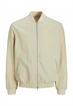Giubbotto bomber color beige chiaro con colletto a costine, chiusura con zip, tasche laterali e polsini elastici. Tessuto resistente con una finitura leggermente strutturata.