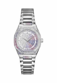 Hõbedane kaheksa nurka kell, millel on kristallidega kaetud nägu ja roosa ning lilla aktsent, roostevabast terasest rihm ja Šveitsi mehhanism.