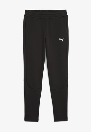 Schwarze Sporthosen aus dehnbarem Stoff, mit einem Hüftbund, seitlichen Taschen und einem kleinen weißen Logo auf dem linken Oberschenkel.