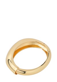 Gold-tone bangle bracelet with a smooth, rounded shape and a secure clasp. Reflective surface with a polished finish.