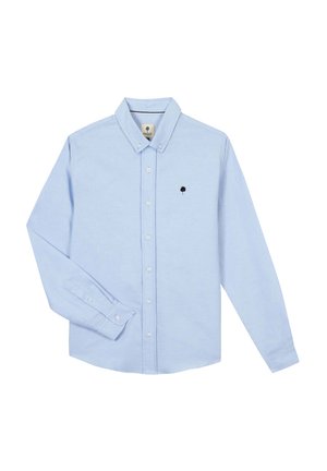 Camicia azzurra a maniche lunghe con bottoni e collo button-down, con un piccolo logo nero a forma di albero sul petto a sinistra.