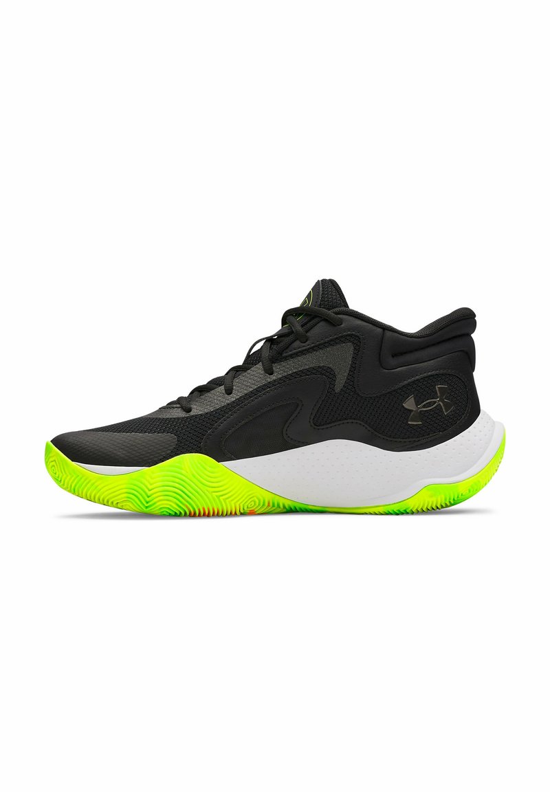 Black athletic shoe with textured mesh upper, vibrant green and white outsole, and reinforced heel collar for support.