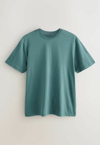 Turkoosi puuvillapaita, jossa on lyhyet hihat, pyöreä kaula-aukko ja rento malli. Pehmeä pinta, minimalistinen muotoilu, ei näkyviä kuvioita tai varusteita.