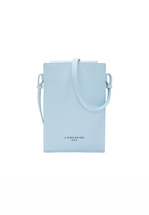 Light blue leather crossbody bag with a rectangular shape, minimalistic design, top handle, and embossed brand logo on the front.
