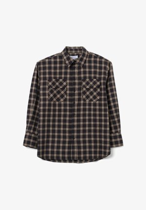 Schwarz-beige karierte Bluse mit langen Ärmeln, Knopfleiste und zwei Brusttaschen. Hergestellt aus gebürstetem Material, mit abgerundetem Saum.