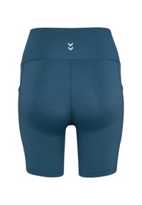Tealfärgade sportshorts med en slät textur, hög midja och sidofickor. Har en subtil logotyp och detaljer med sömnad.