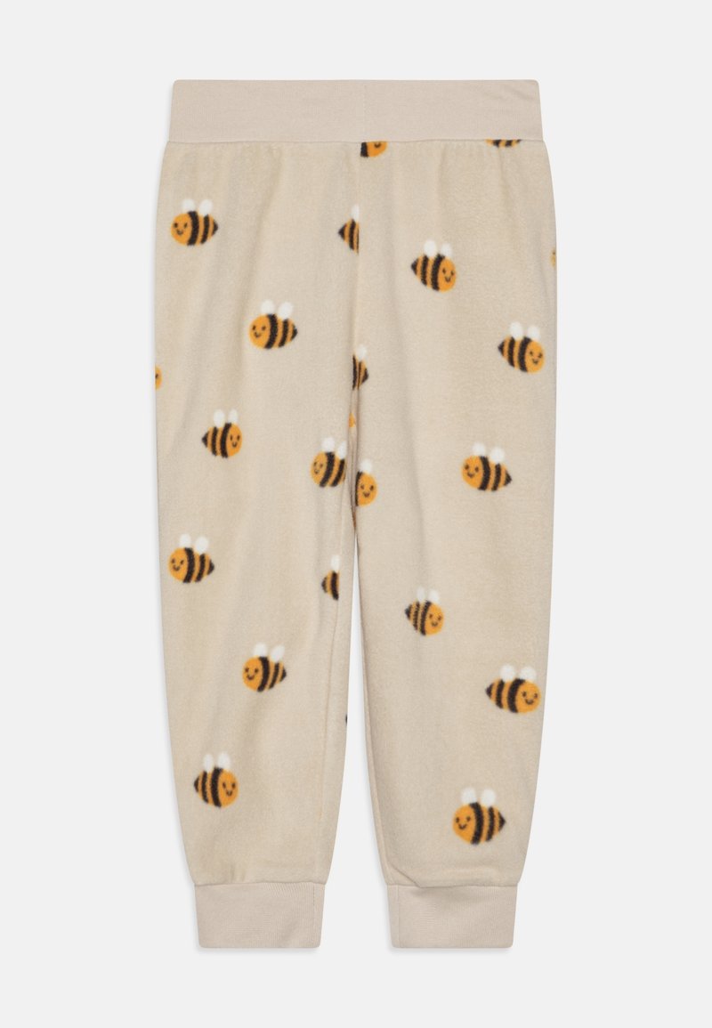 Pantalon enfant beige doux avec motifs d'abeilles souriantes partout, taille élastique et chevilles avec revers.