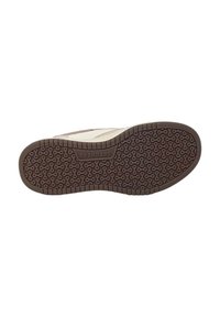 Semelle de sneaker Skechers en caoutchouc brun texturé, avec un design de grip à motifs et un profil latéral lisse dans des couleurs neutres.
