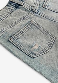 Next WIDE  - Relaxed fit jeans - denim tint