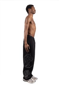 FAVELA JOGGER - Verryttelyhousut - black