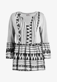 Vybráno, bianco sporco