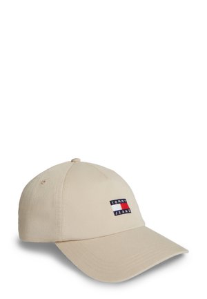 Beige baseballpet met gebogen klep met een klein Tommy Jeans-logo in rood, wit en blauw op het voorpaneel.