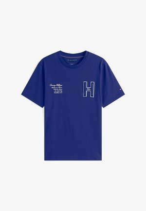 Marineblauwe katoenen T-shirt met een gestikt 'H' en geprinte logodetails aan de voorkant. Klassieke ronde hals en korte mouwen.