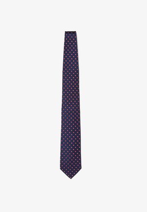 Cravate navy avec un motif rouge en étoiles répétées, fabriquée en tissu lisse avec une coupe slim et une pointe effilée.