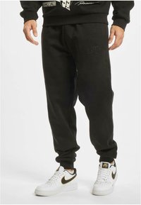 Roberto Cavalli Junior - ROCAWEAR DUNCAN - Jogginghose - black Thumbnail-Bild 1