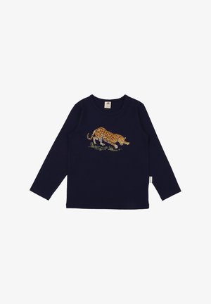 Navy long-sleeve shirt with round neck, featuring a crouching leopard illustration above green grass on the front center.