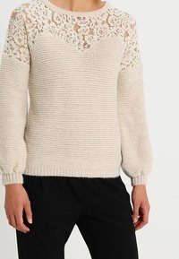 NAF NAF Stickad tröja - beige