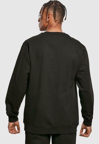 Merchcode RECKLESS BASIC CREWNECK - Sweatshirt - black