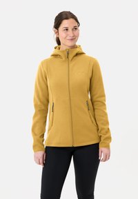 Fleeced vest in mosterdgeel, met een ritssluiting aan de voorkant, capuchon en twee ritssluitingen in de zakken. Soepele textuur, sportieve pasvorm en logo op de borst.