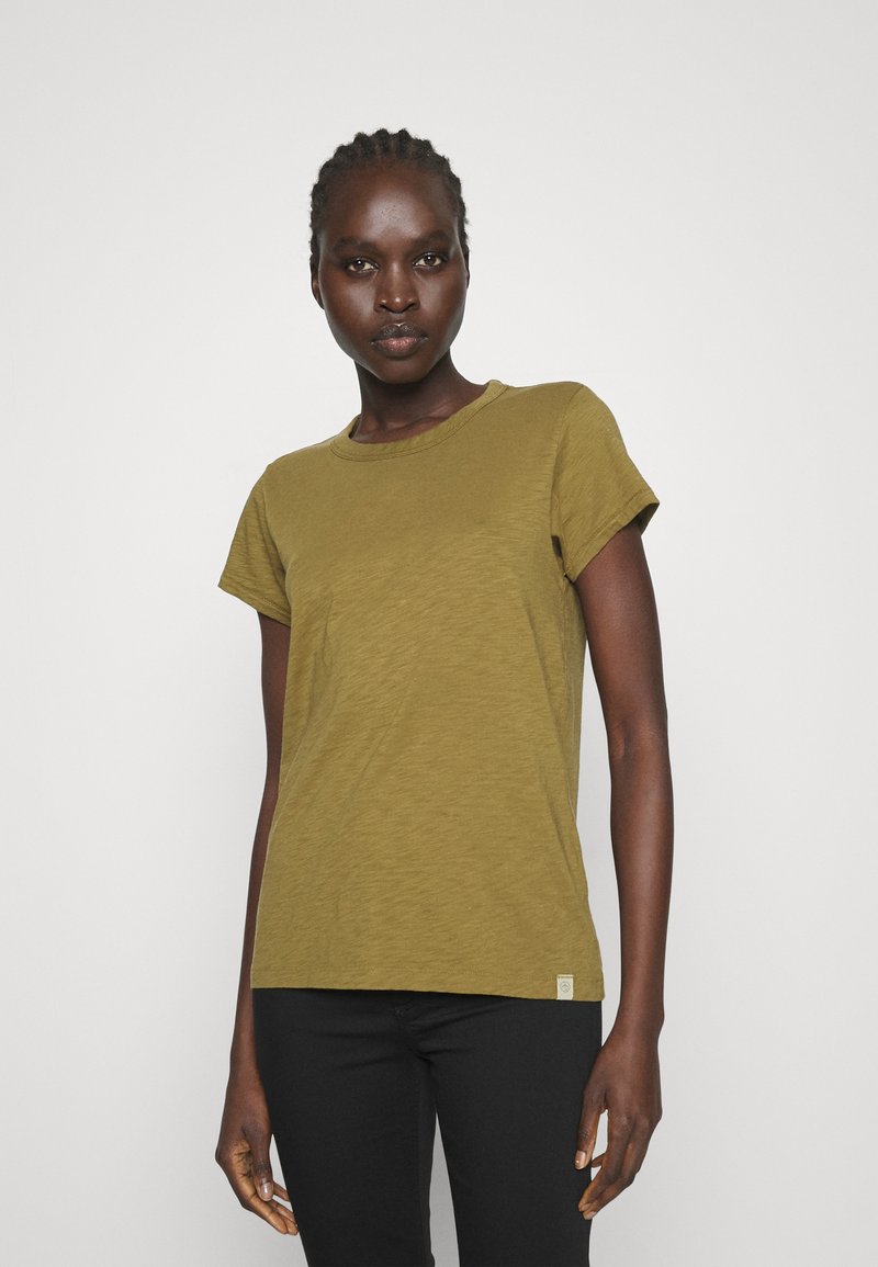 Olive green short-sleeve t-shirt in a soft, textured fabric with a rounded neckline and a small logo tag at the hem.