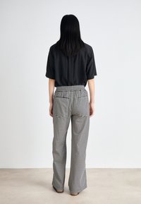 Mads Nørgaard COLIN SONIE PANTS - Housut - black