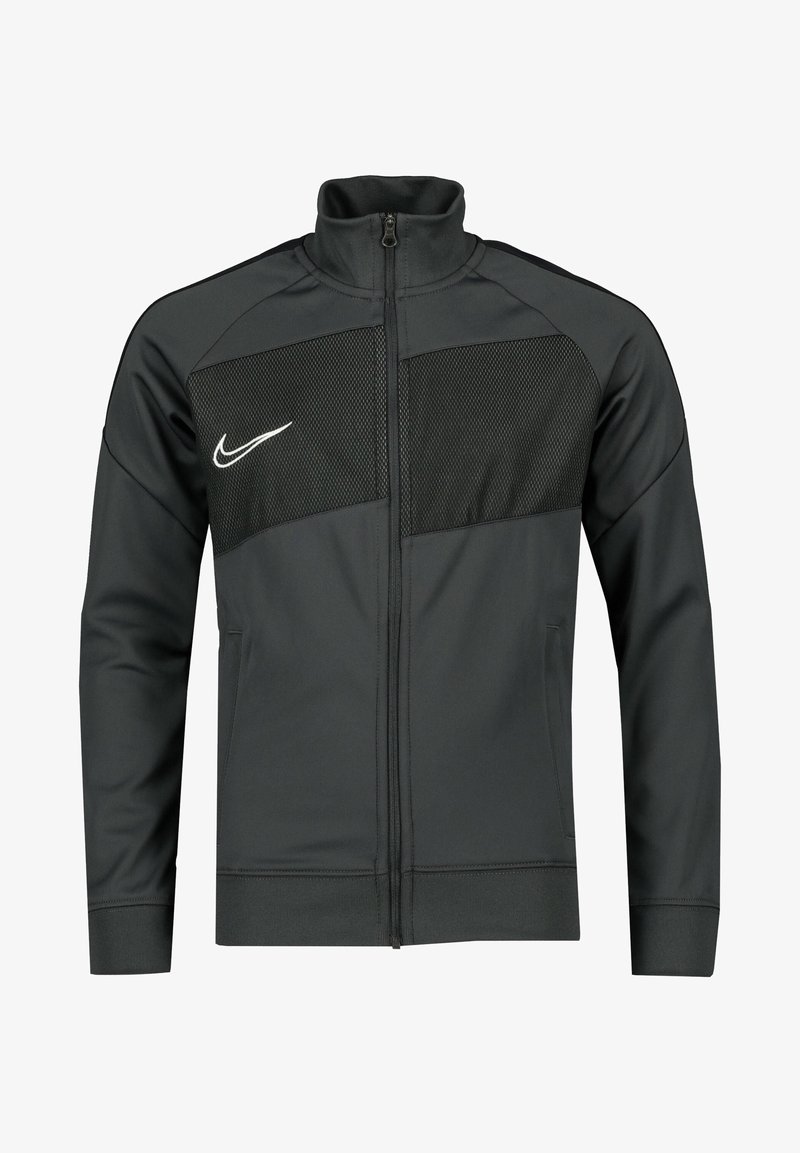 Tmavě šedá zipová bunda vyrobená z hladkého materiálu, s síťovinou na prsou, obsahující bílé logo Nike a boční kapsy.