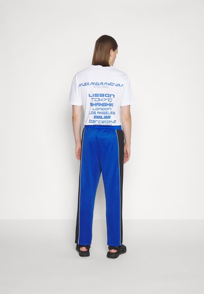 Alexandra Moura DUALITY TROUSERS - Donji dijelovi trenirke - sports blue