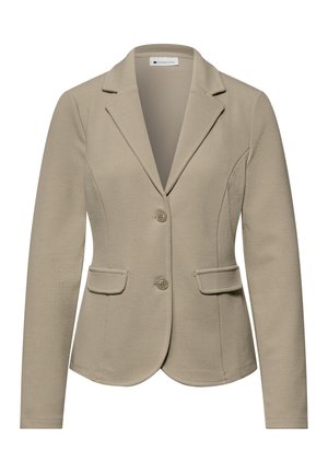 Blazer texturé beige pour femme avec deux boutons, revers crantés, manches longues et deux poches avant à rabat.
