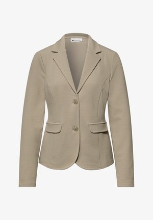 Blazer texturé beige pour femme avec deux boutons, revers crantés, manches longues et deux poches avant à rabat.