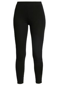Leggings noirs en tissu extensible, avec une taille haute et un design ajusté qui se resserre aux chevilles. Texture lisse sans motifs.
