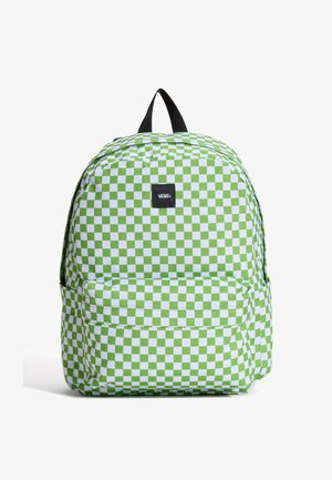Sac à dos à carreaux verts et blancs avec une texture en tissu, doté d'une poignée supérieure, d'une poche zippée à l'avant et d'un logo de marque sur un patch noir.