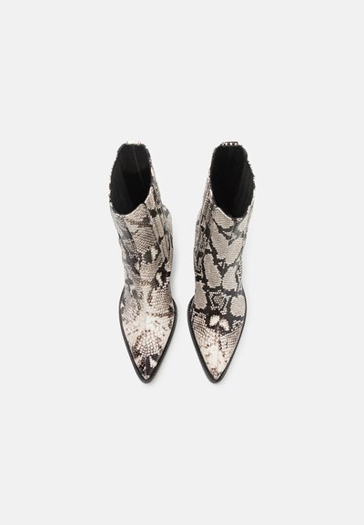 Snakeskin ankle boots with a pointed toe and an elasticized shaft. Color features shades of beige and black, simulating a reptile pattern.