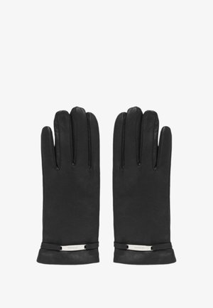 Černé kožené rukavice s hladkou texturou, disponující přiléhavým střihem a stříbrným akcentem na zápěstí pro zdůraznění detailu.